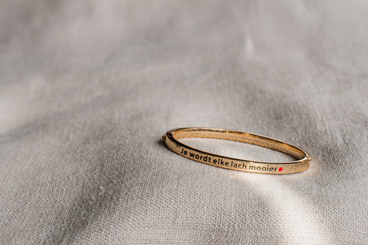 Armbandje 'Je wordt elke lach mooier'